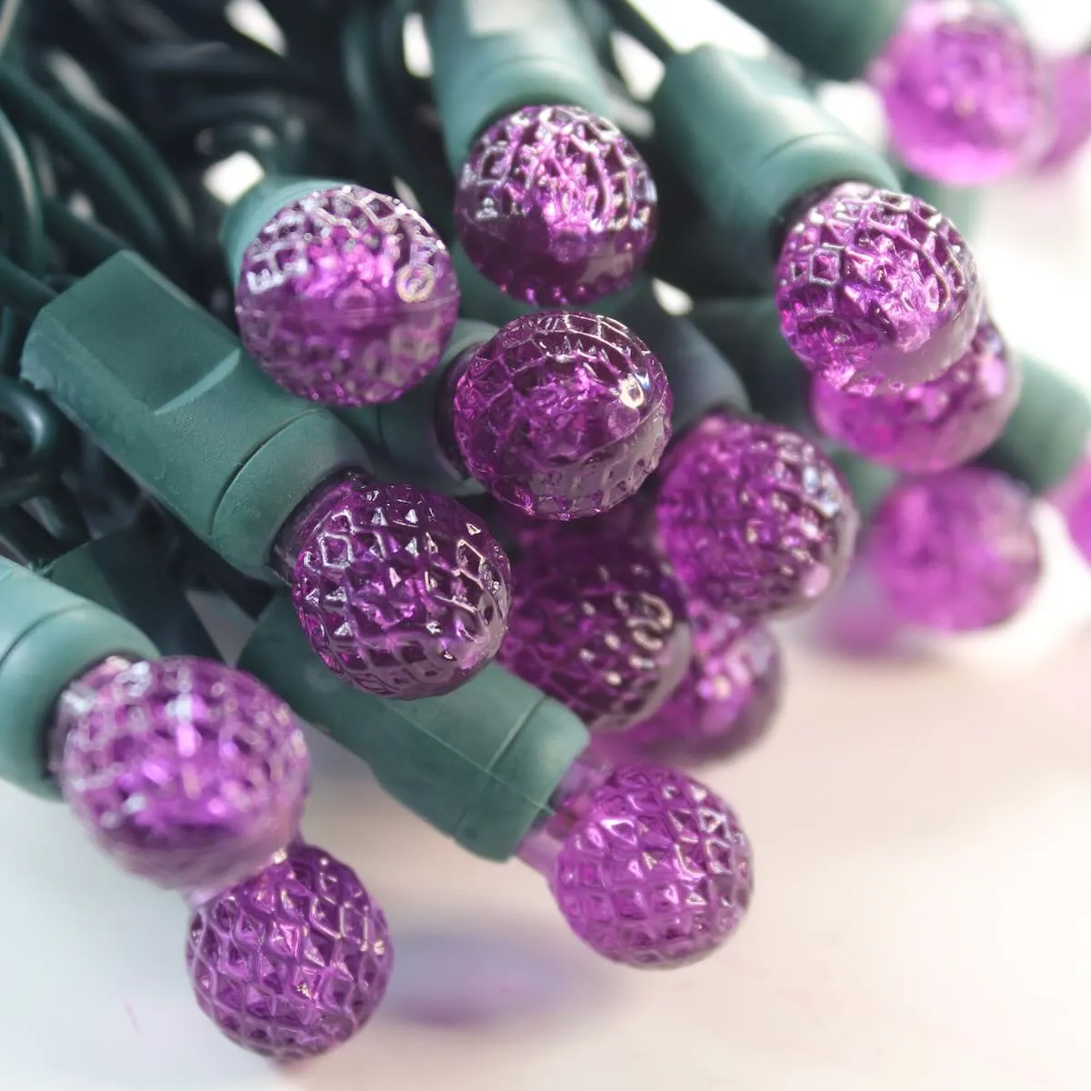 50-light  G12 Purple LED Christmas Lights, 4" Spacing Green Wire