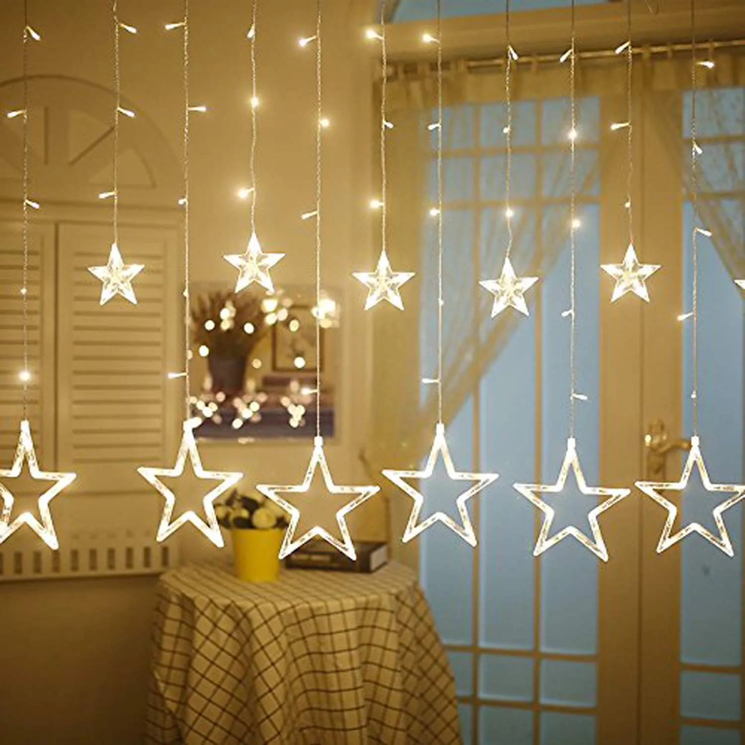 Kuber Industries 138 LED Curtain String Lights with 8 Flashing Modes Decoration(12 Stars, Warm White) -CTKTC22954