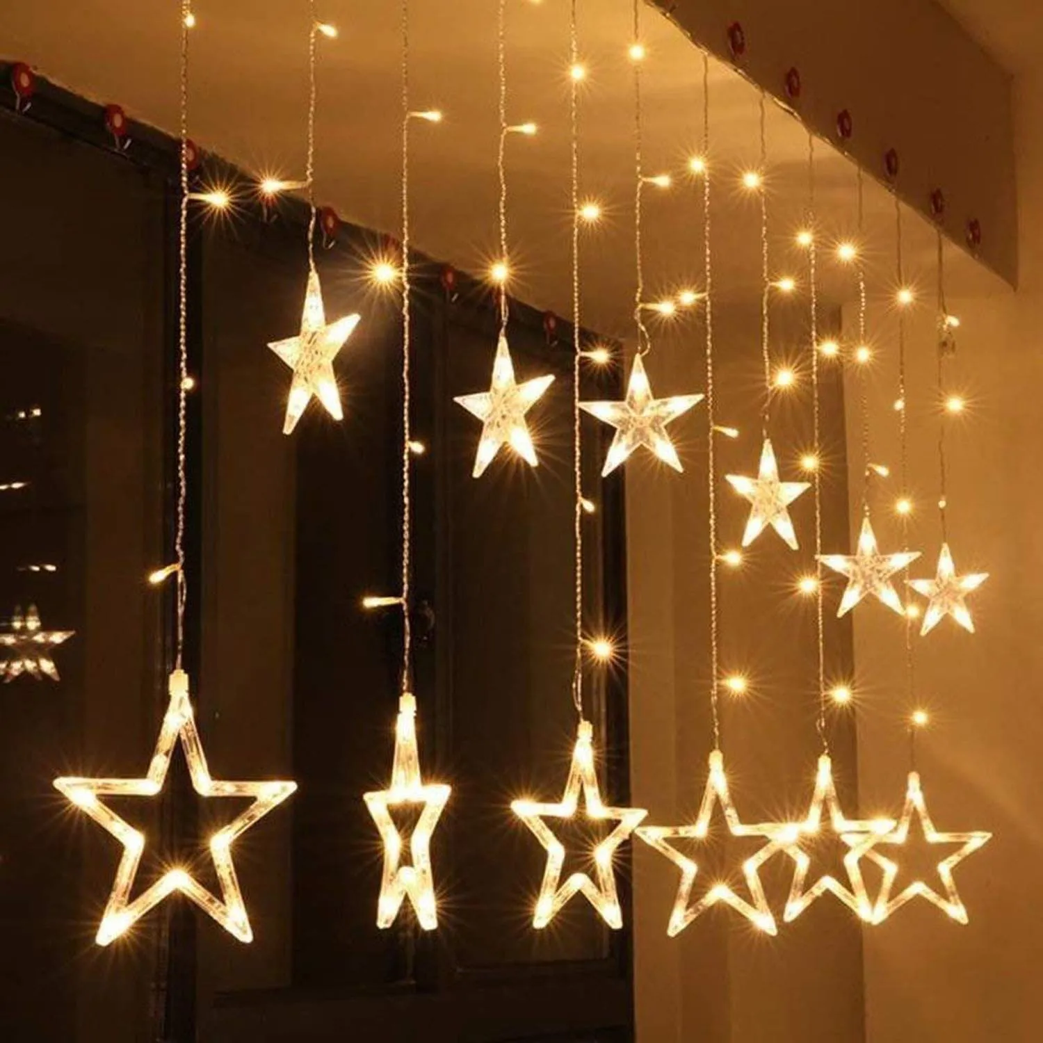 Kuber Industries 138 LED Curtain String Lights with 8 Flashing Modes Decoration(12 Stars, Warm White) -CTKTC22954